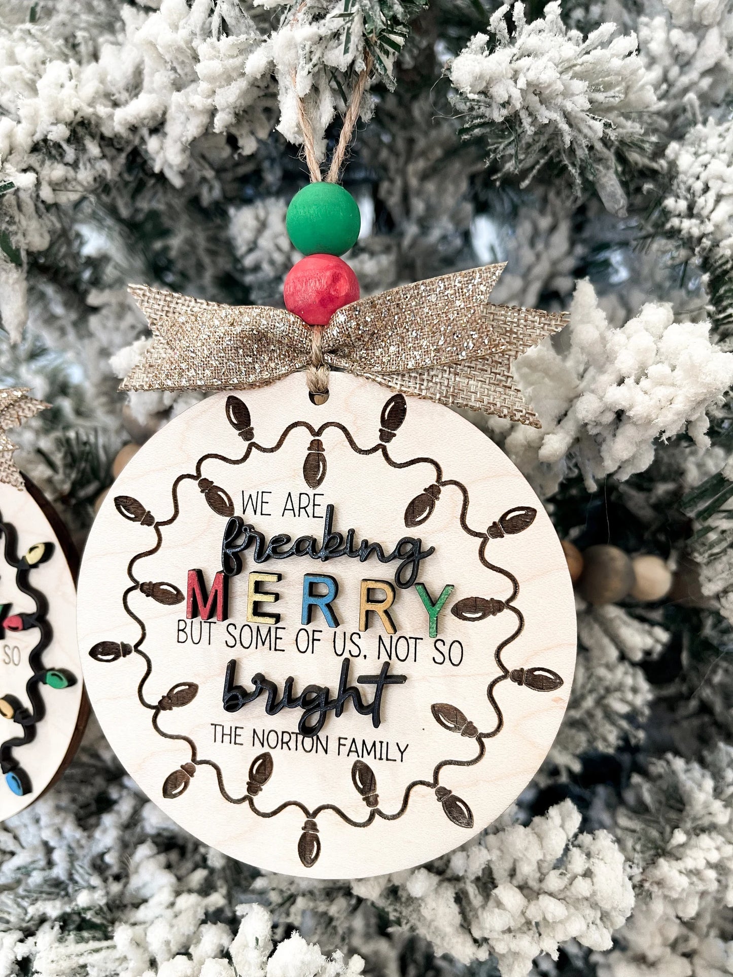 Customizable Family "We Are Freaking Merry But Some Of Us, Not So Bright" Christmas Door Hanger Sign / Ornament Laser Cut File | Glowforge