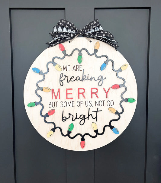 Customizable Family "We Are Freaking Merry But Some Of Us, Not So Bright" Christmas Door Hanger Sign / Ornament Laser Cut File | Glowforge