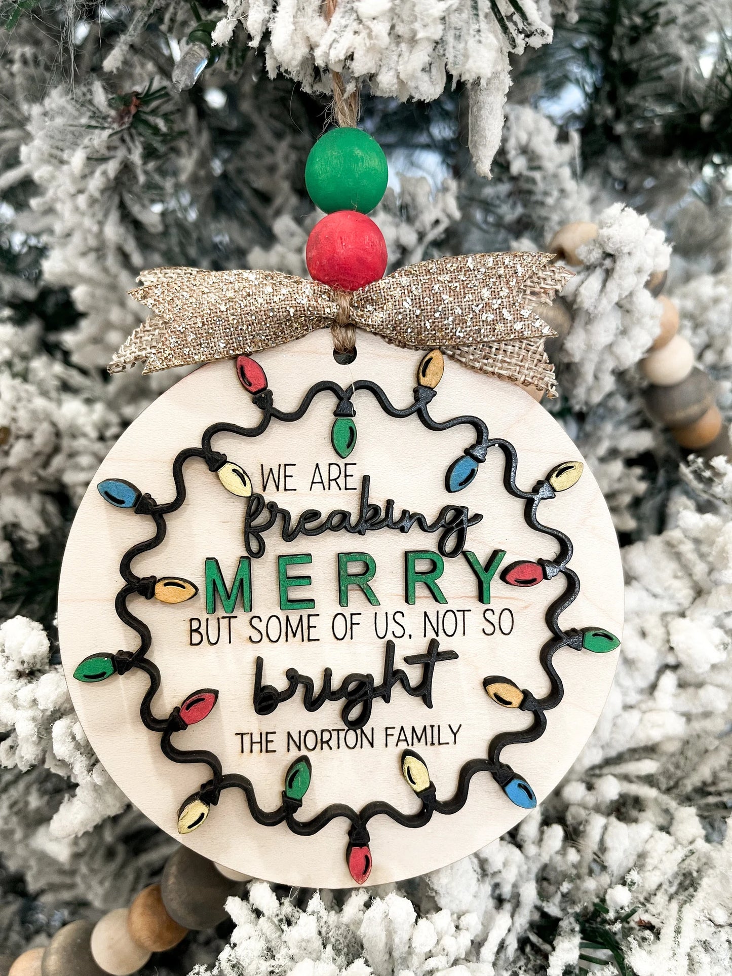 Customizable Family "We Are Freaking Merry But Some Of Us, Not So Bright" Christmas Door Hanger Sign / Ornament Laser Cut File | Glowforge