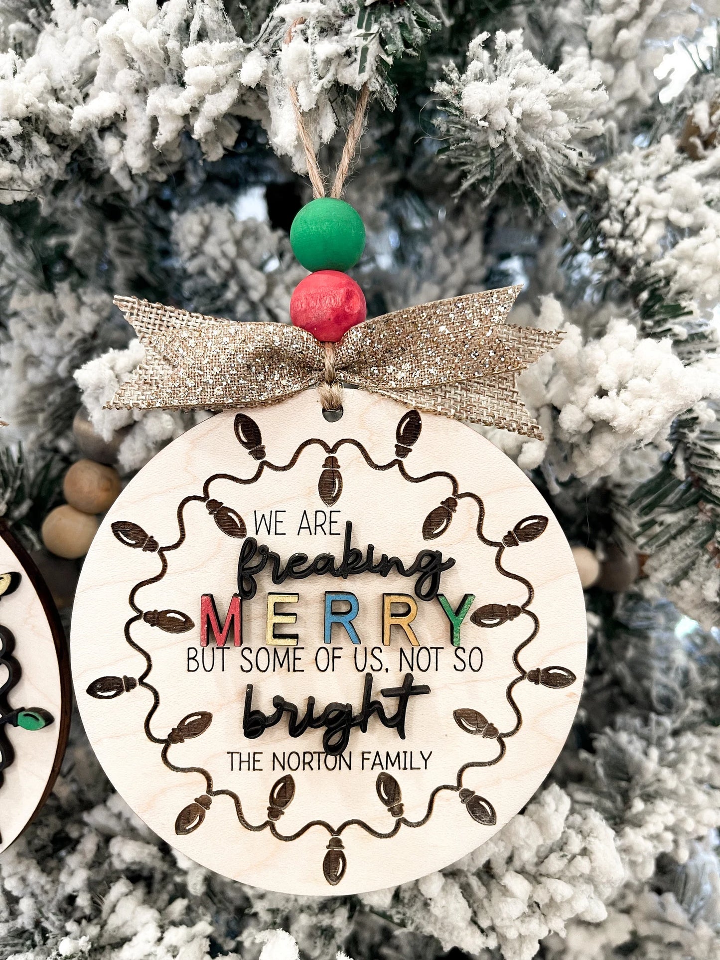 Customizable Family "We Are Freaking Merry But Some Of Us, Not So Bright" Christmas Door Hanger Sign / Ornament Laser Cut File | Glowforge