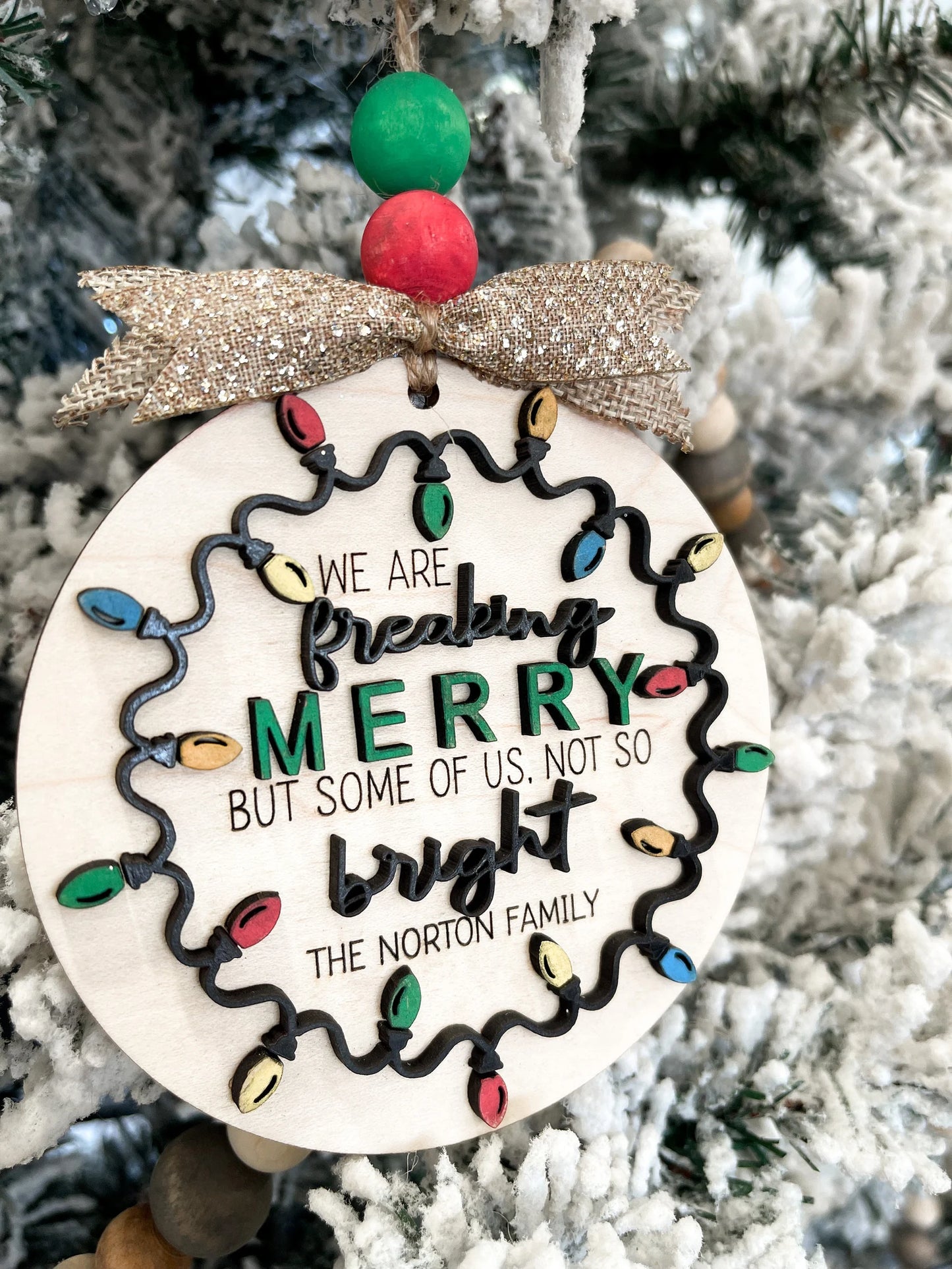 Customizable Family "We Are Freaking Merry But Some Of Us, Not So Bright" Christmas Door Hanger Sign / Ornament Laser Cut File | Glowforge