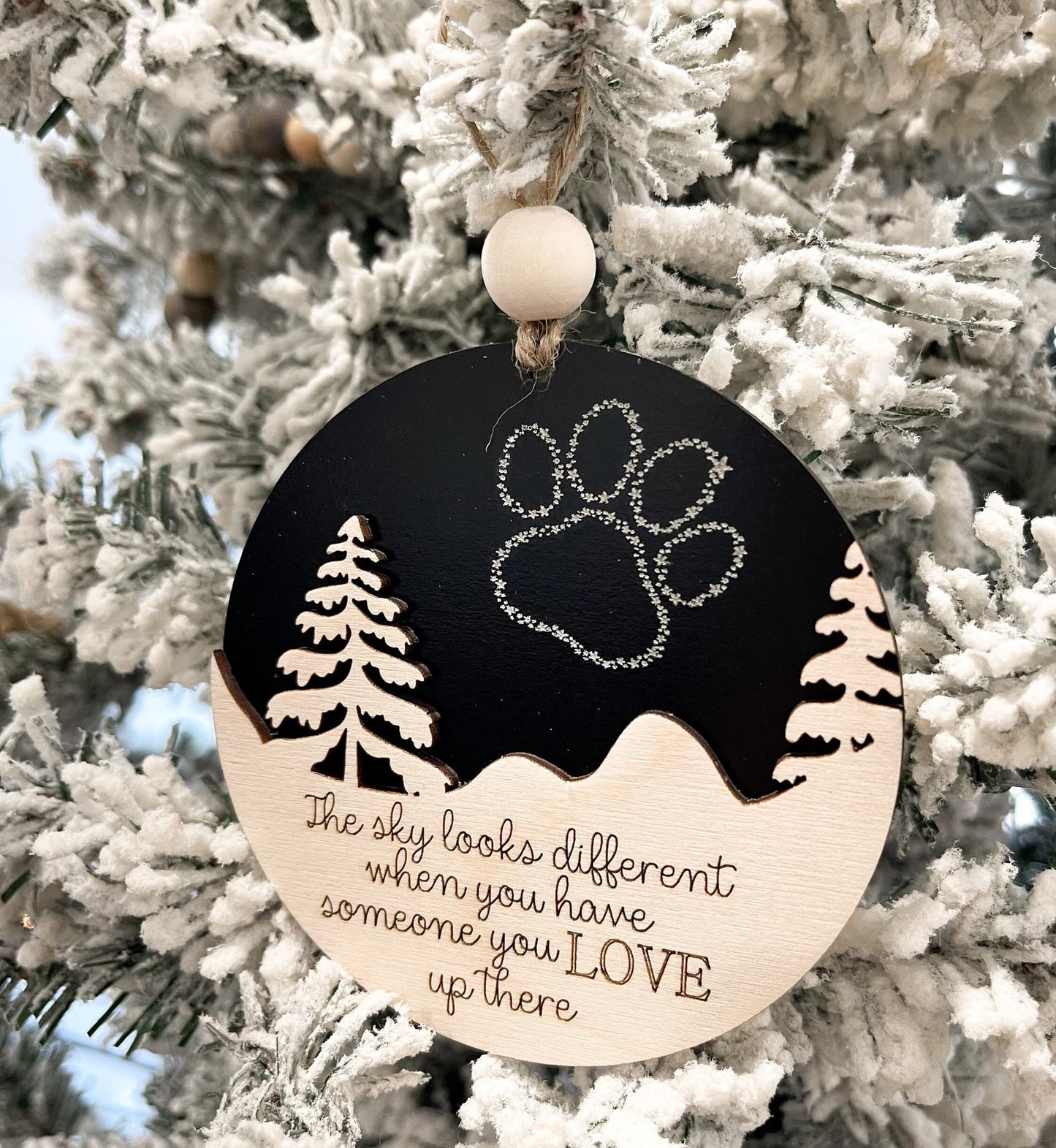Customizable Dog Paw Memorial "The Sky Looks Different When You Have Someone You Love Up There" Ornament & Stand Laser Cut File | Glowforge