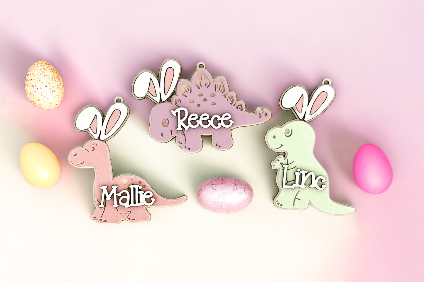 Cute Customizable Dinosaurs w/ Bunny Ears Easter Basket Name Tag Laser Cut Digital File | Customizable Easter Basket Name Tag SVG | T- Rex, Brontosaurus, and Stegosaurus